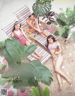 A group of women in bathing suits posing for a magazine.