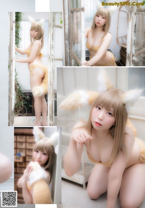 A woman in a pink bunny costume posing for a picture.