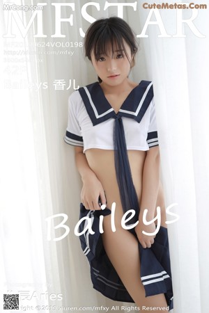A woman in a school uniform is posing for the camera.