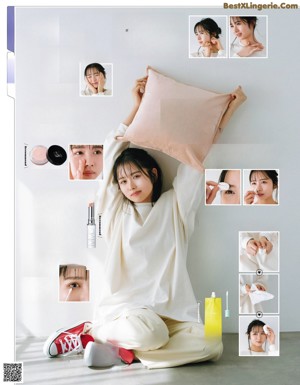 A woman in a white shirt is posing for a magazine.